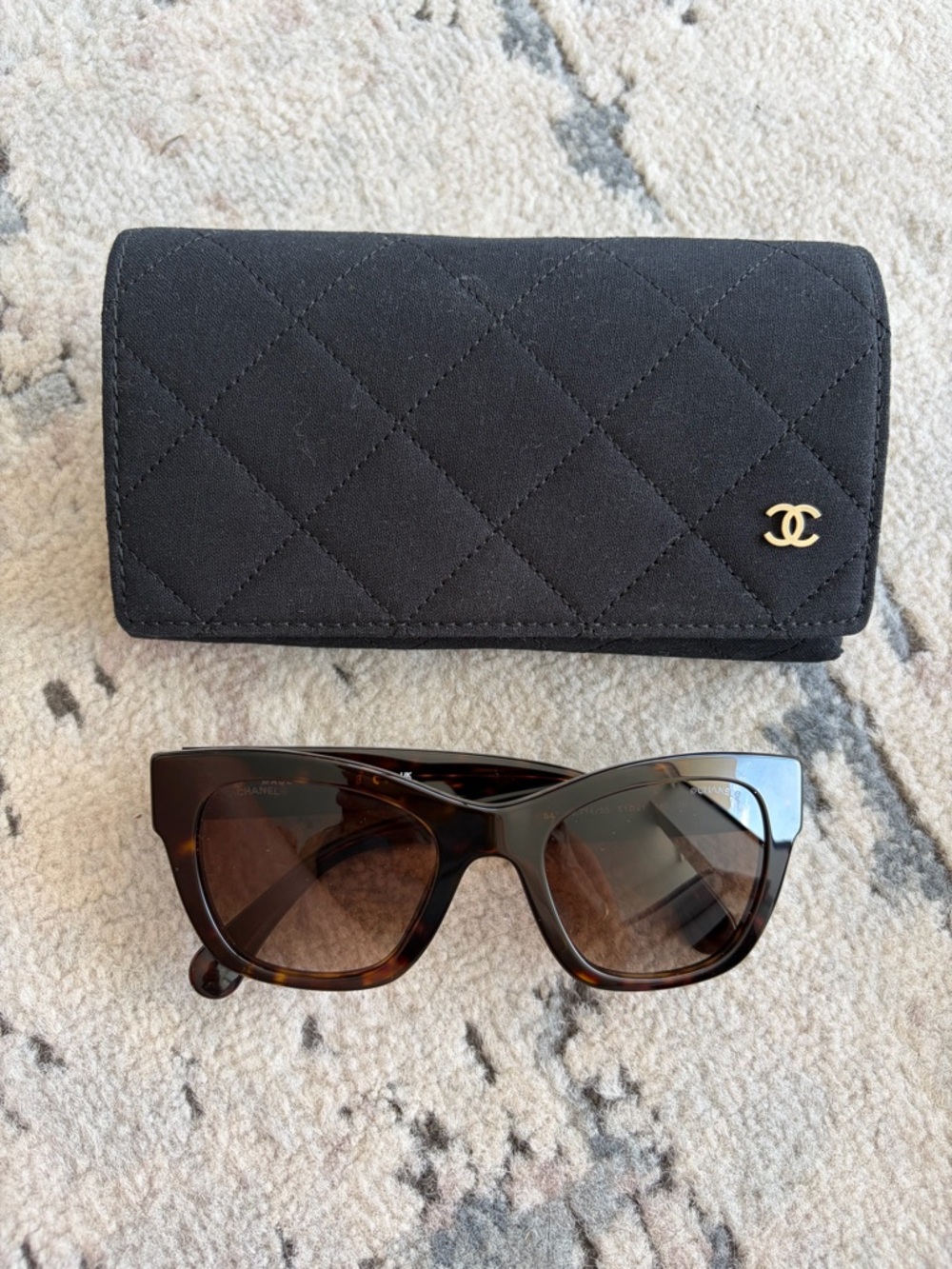 CHANEL Tortoiseshell Cat-Eye Sunglasses with black quilted sunglass case